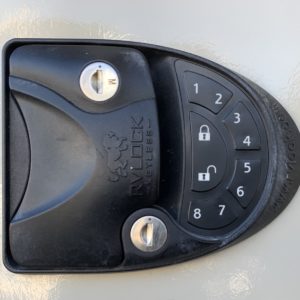 keypad with two key holes in an RV door handle