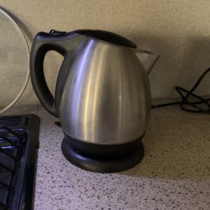 an electric kettle on a counter.